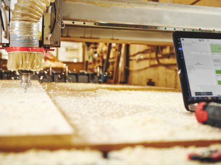 CNC router machine creates a layout of the shelf complex.